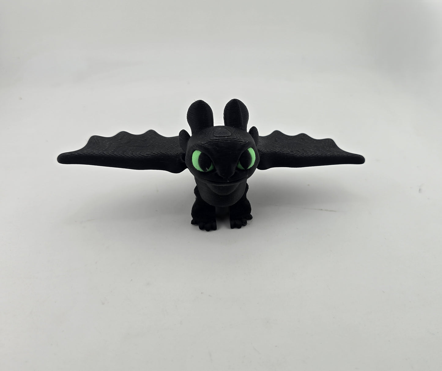 Green Eyed Flying dragon with wings