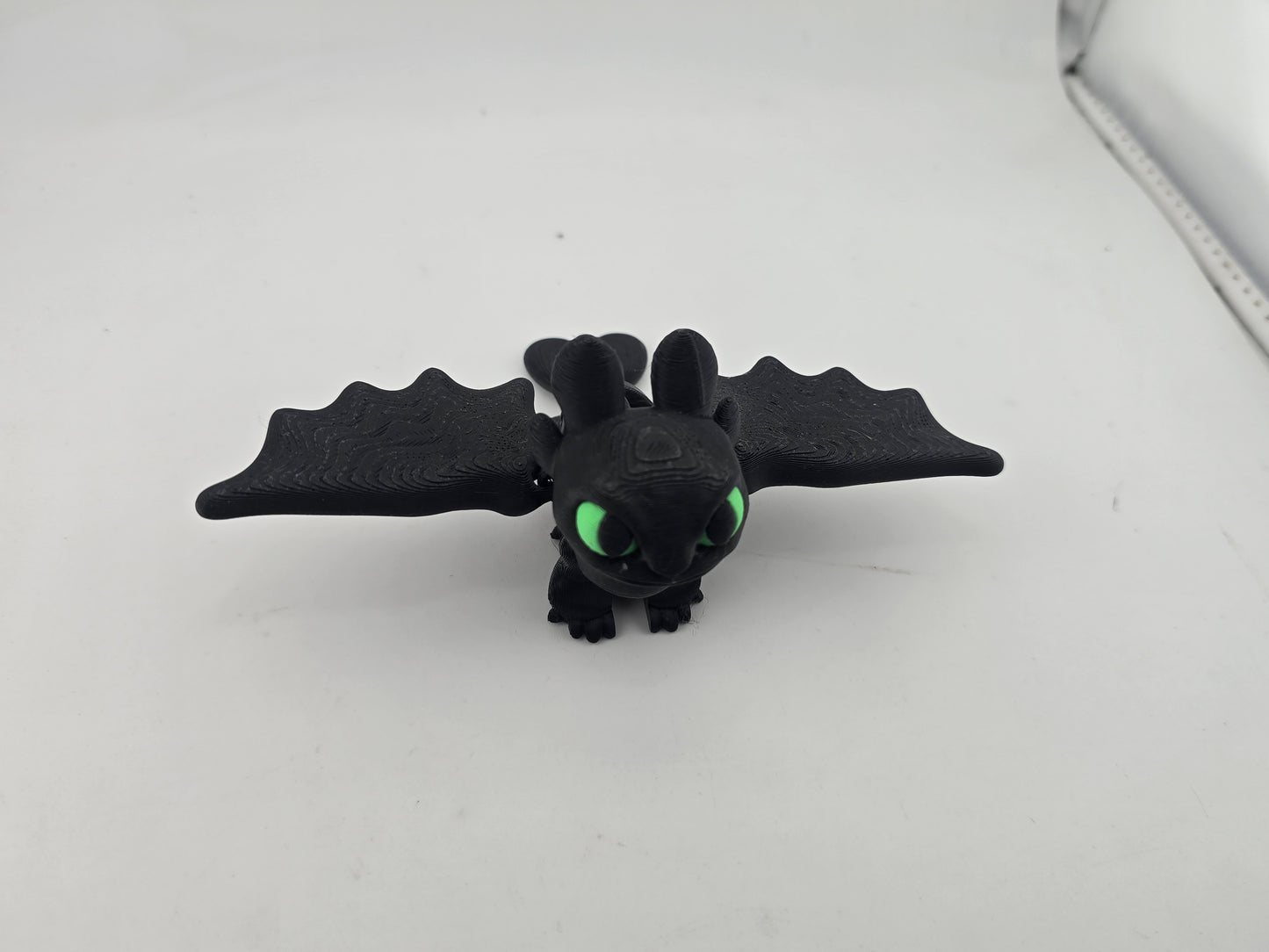 Green Eyed Flying dragon with wings